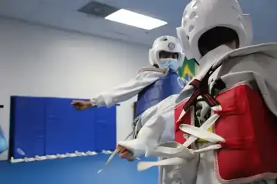 Taekwondo students sparring at Han Mi